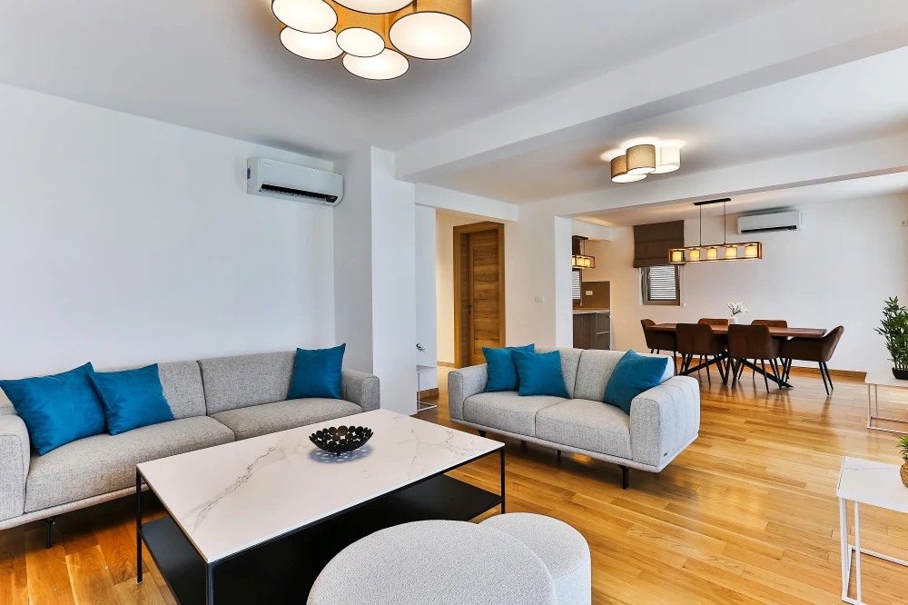 Living Room with Blue Details at Pearl of Adriatic Lux Apart